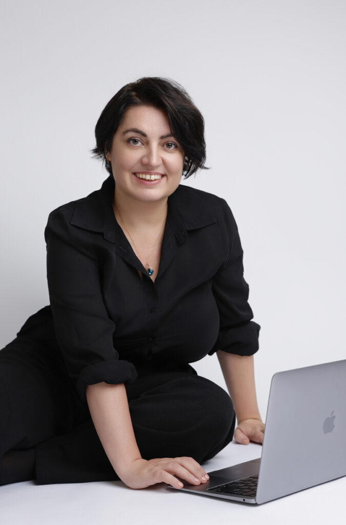 Andreea Amzu working on brand design projects