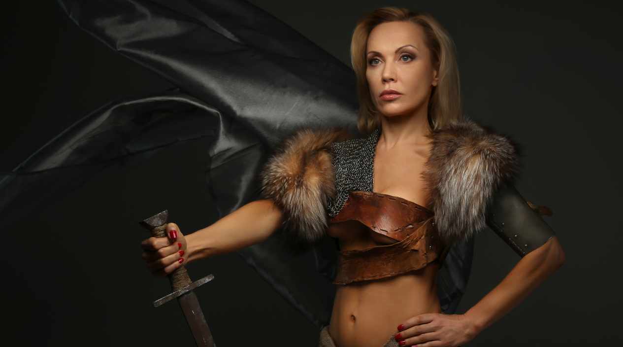 Fierce Viking female fighter embodying courage and strength – Hero Brand Archetype